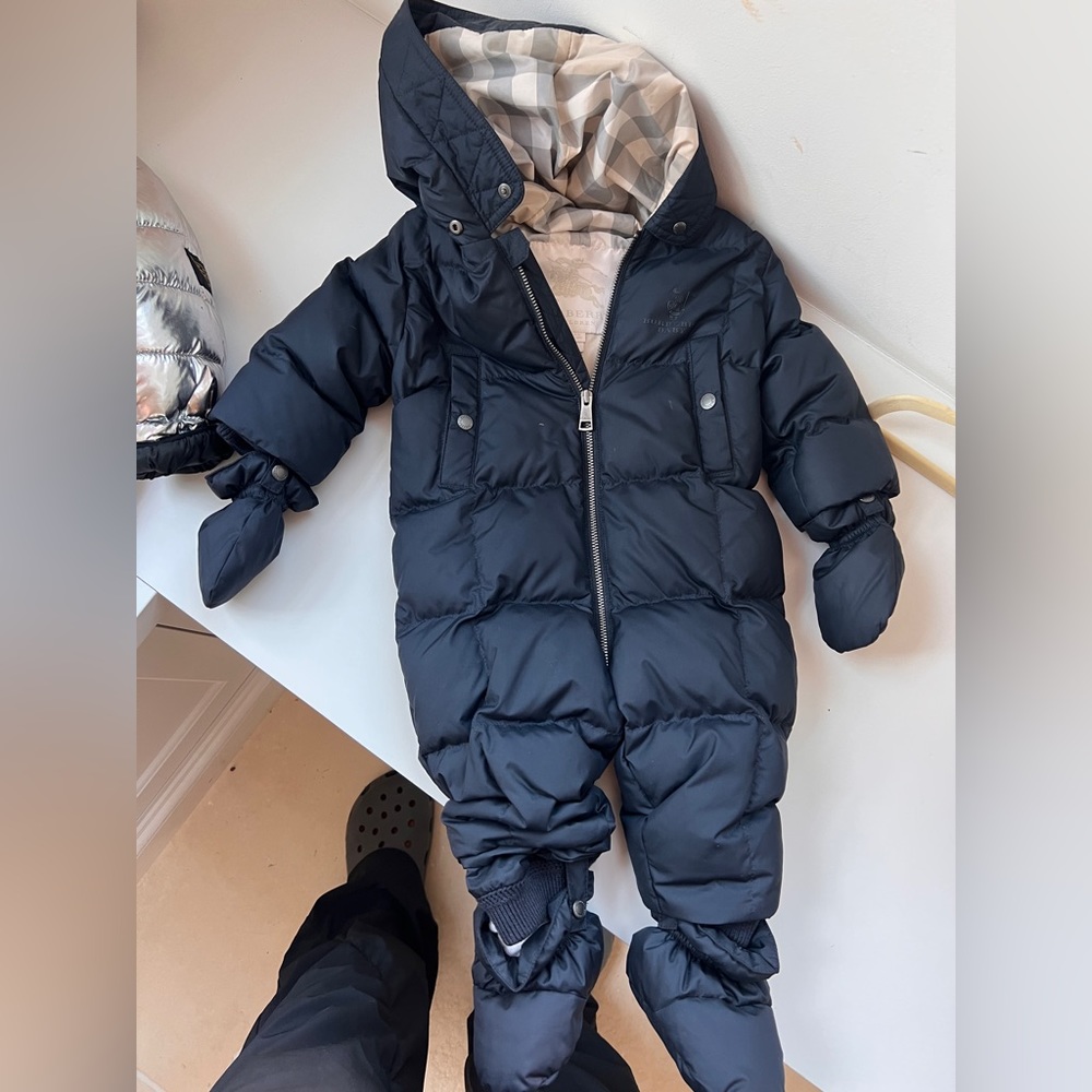 Burberry black snowsuit size 6 months, fits past 12-15
Months